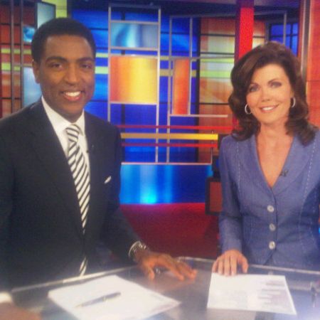 Hughes covering the evening news with his female anchor in South Florida T.V. What is Hughes' salary in 2021? Explore his net worth!